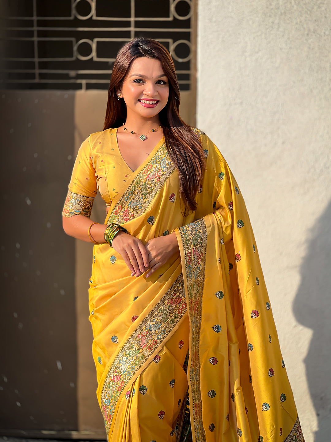 Dark yellow baluchari silk zari woven saree