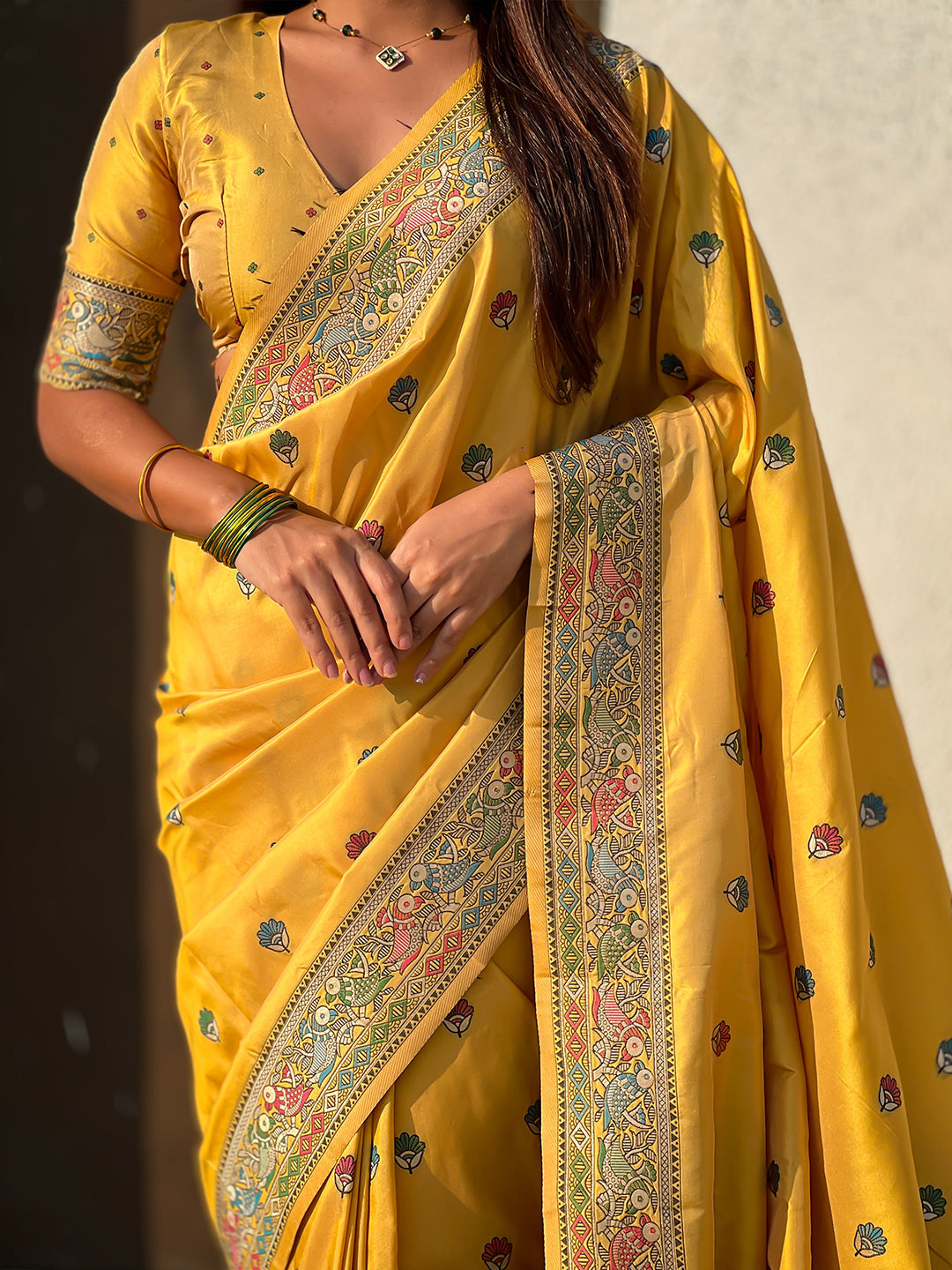 Dark yellow baluchari silk zari woven saree