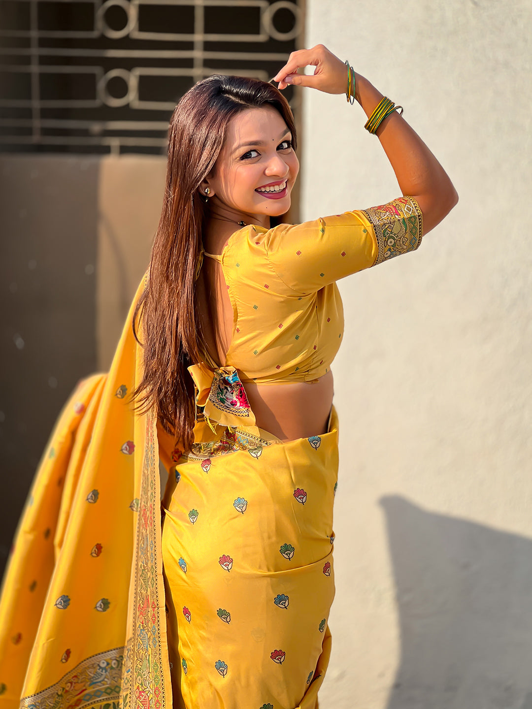Dark yellow baluchari silk zari woven saree