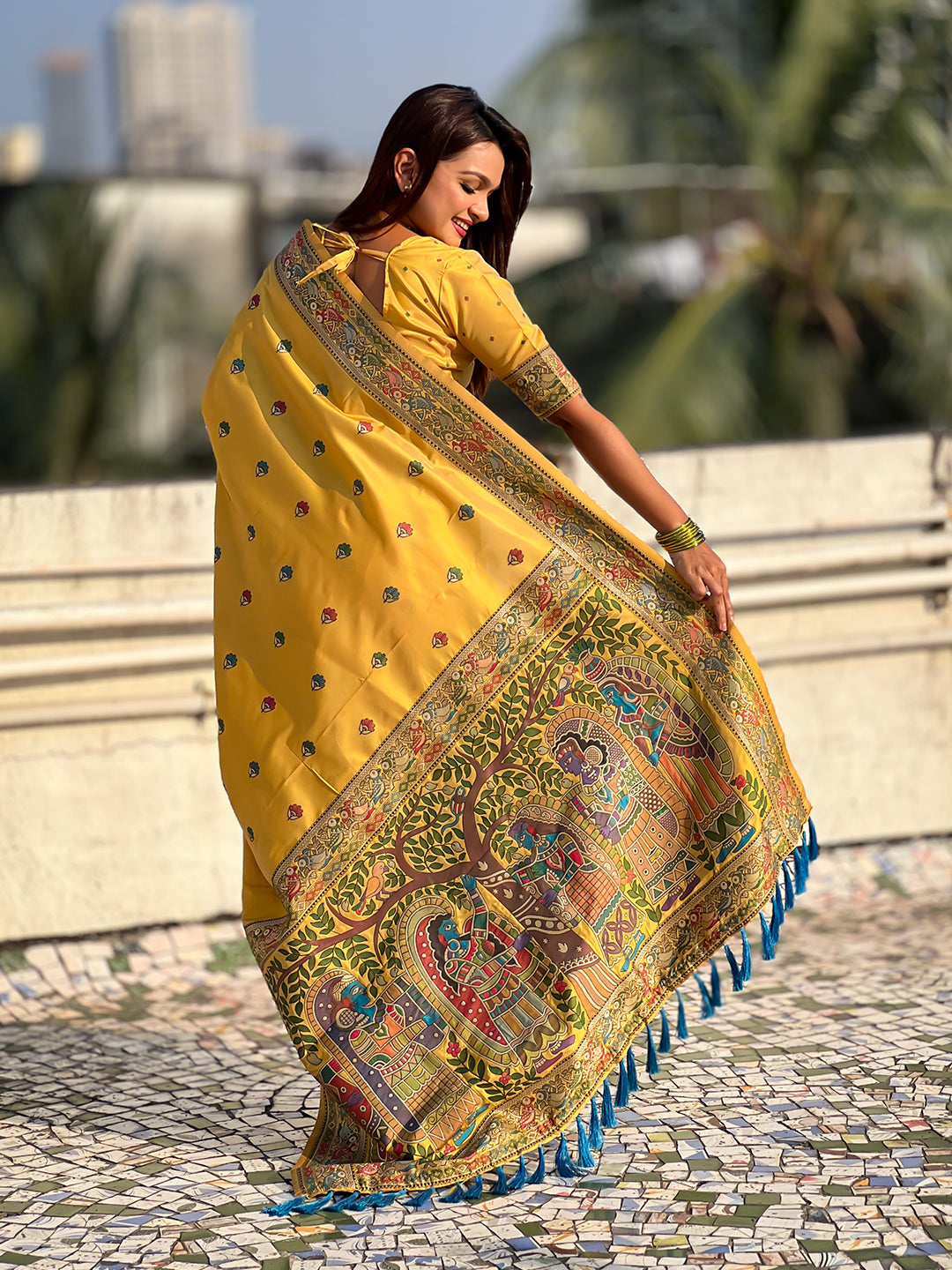 Dark yellow baluchari silk zari woven saree