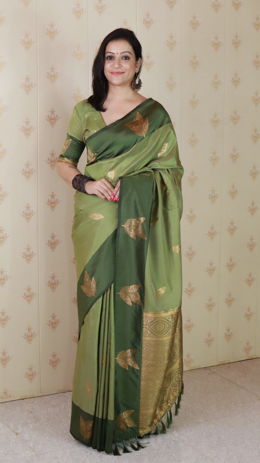 Green soft silk dusty concept floral zari woven saree
