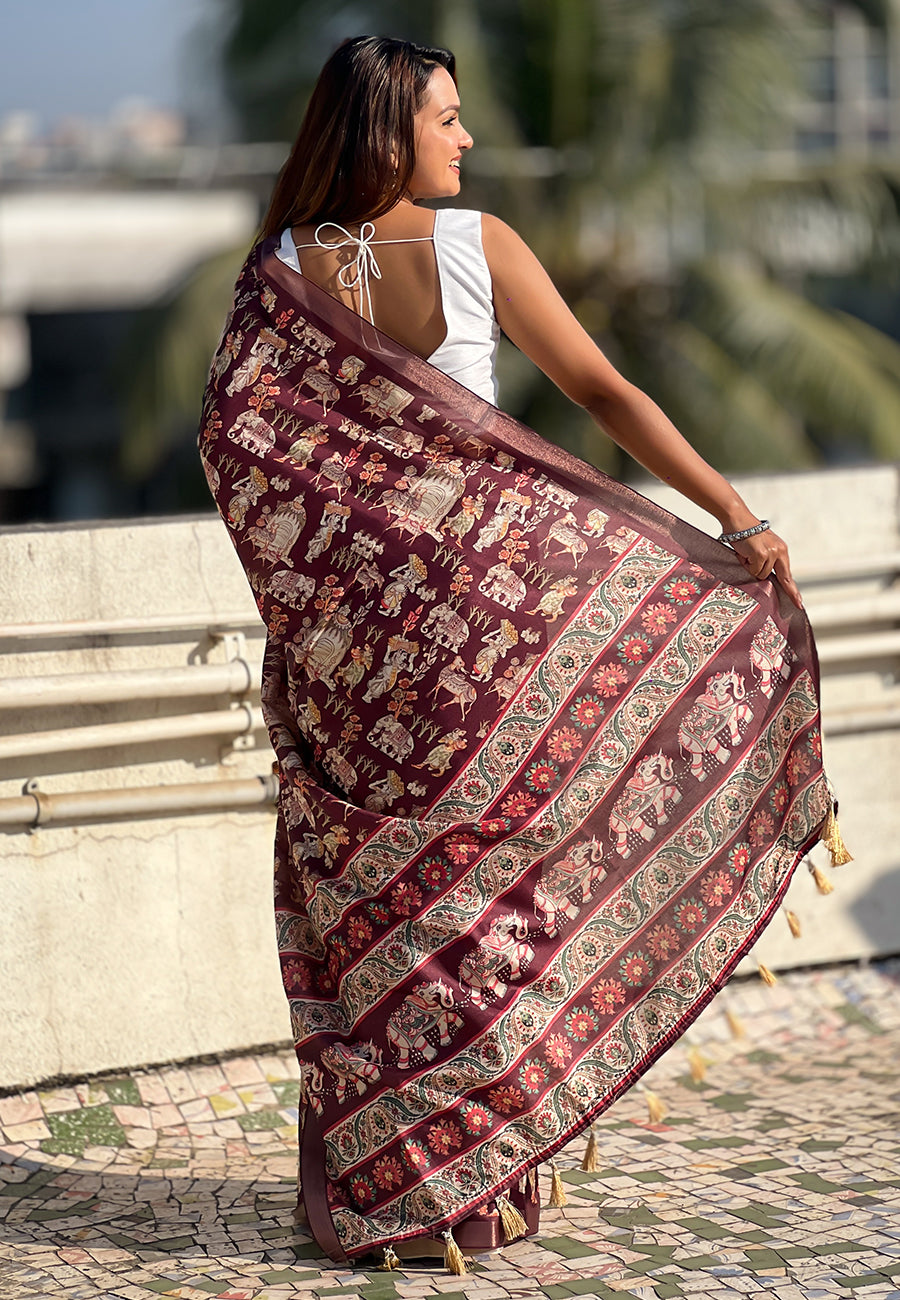 Dark brown tussar silk printed saree with zari woven border