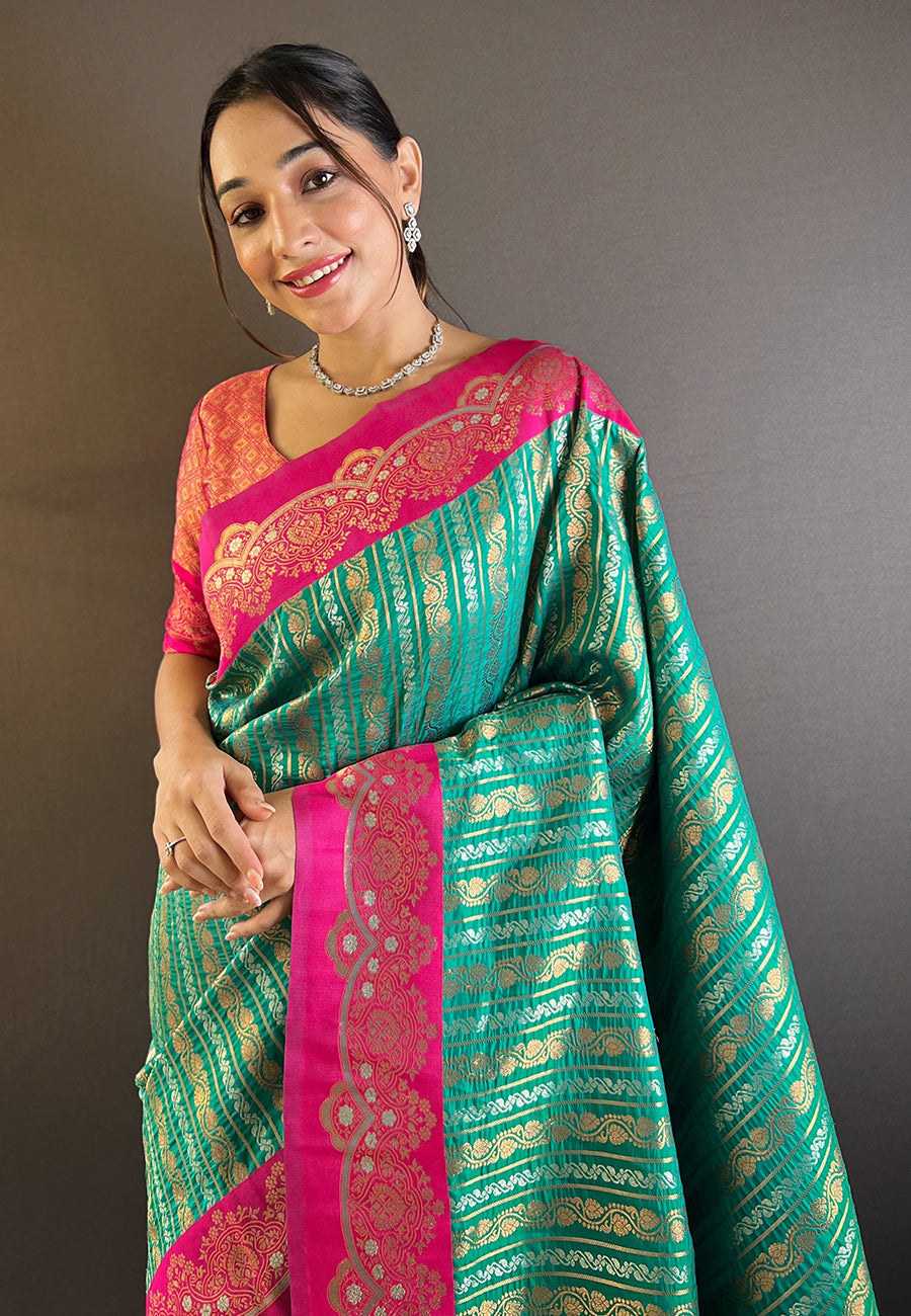 Green with pink contrast zari woven silk saree with satin unique border