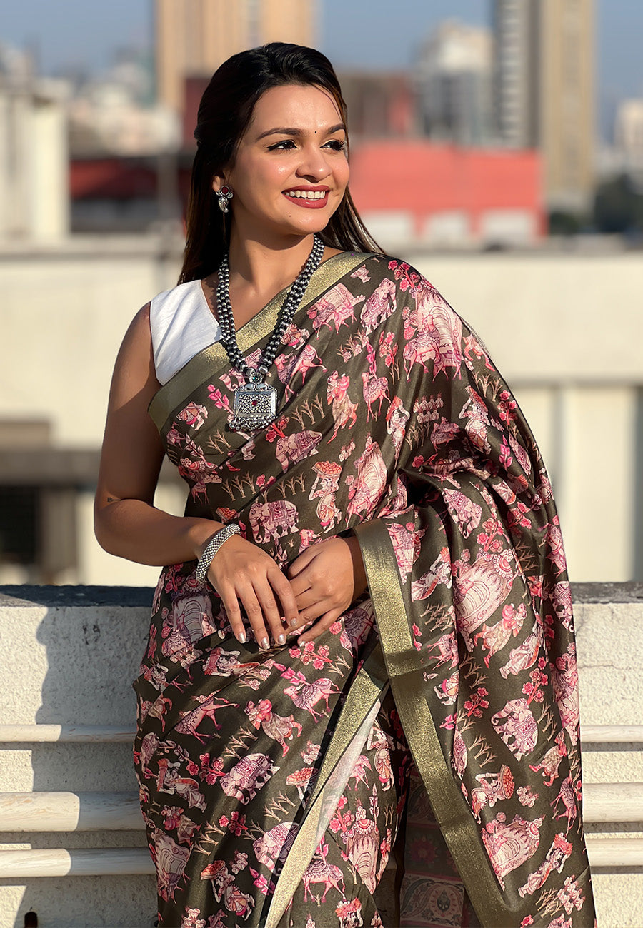 Bottle green tussar silk printed saree with zari woven border