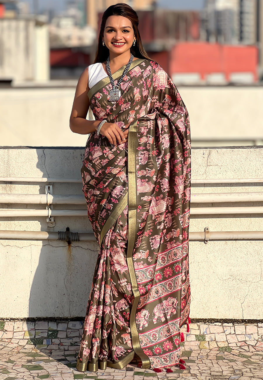 Bottle green tussar silk printed saree with zari woven border