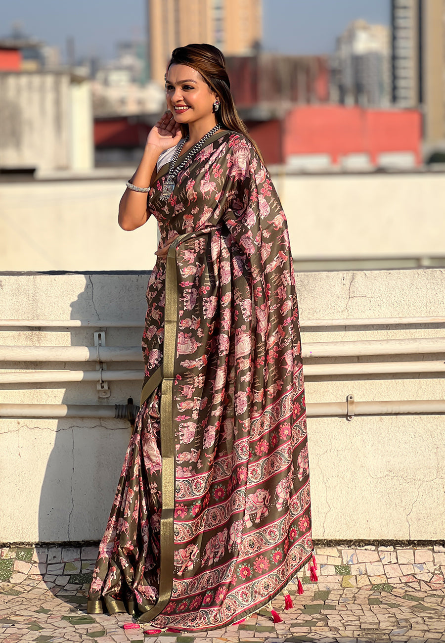 Bottle green tussar silk printed saree with zari woven border