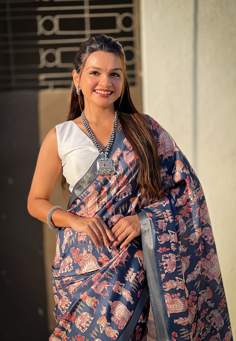 Dark blue tussar silk printed saree with zari woven border