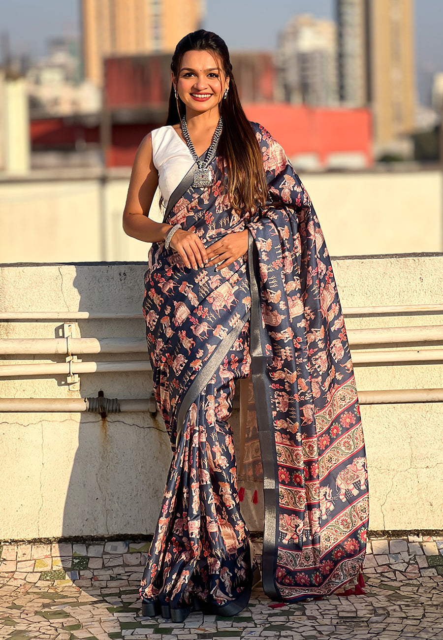 Dark blue tussar silk printed saree with zari woven border
