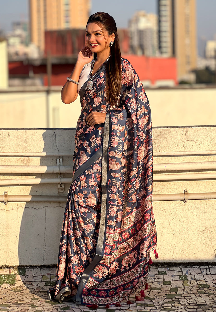 Dark blue tussar silk printed saree with zari woven border