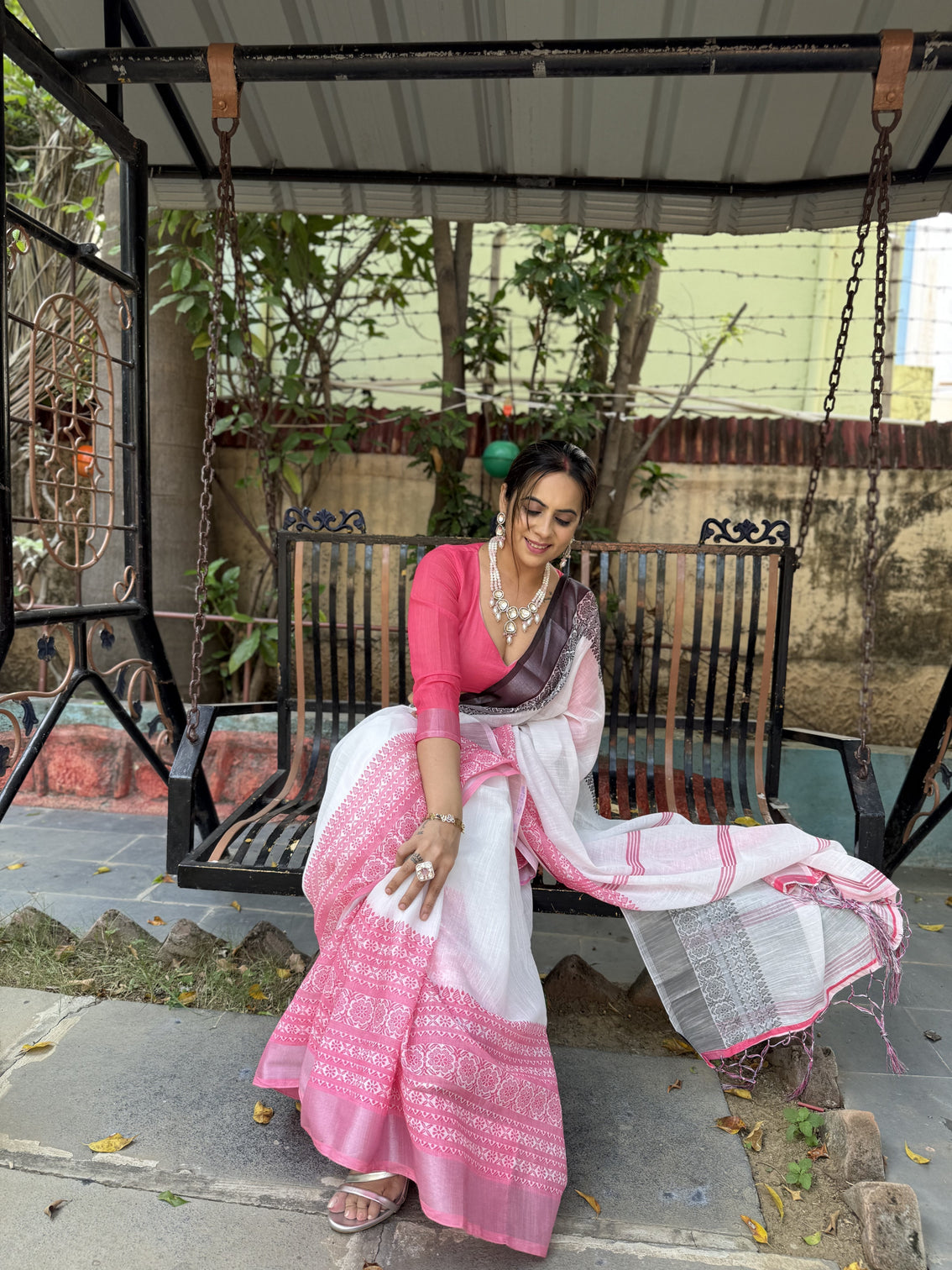 Elegant white and pink pure linen digital printed saree with black border tassels and blouse piece intricate floral and geometric design