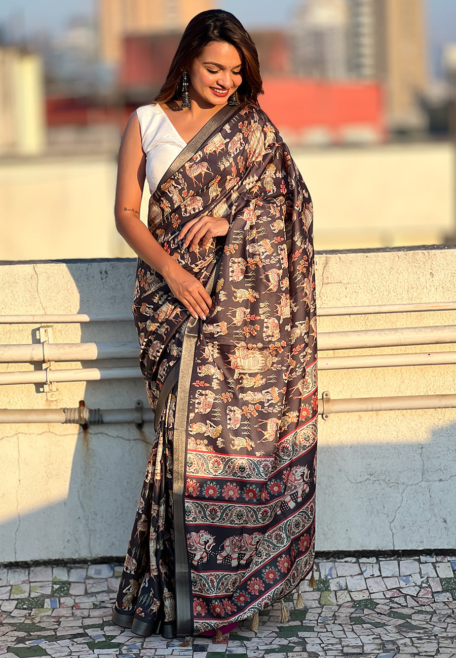Black tussar silk printed saree with zari woven border