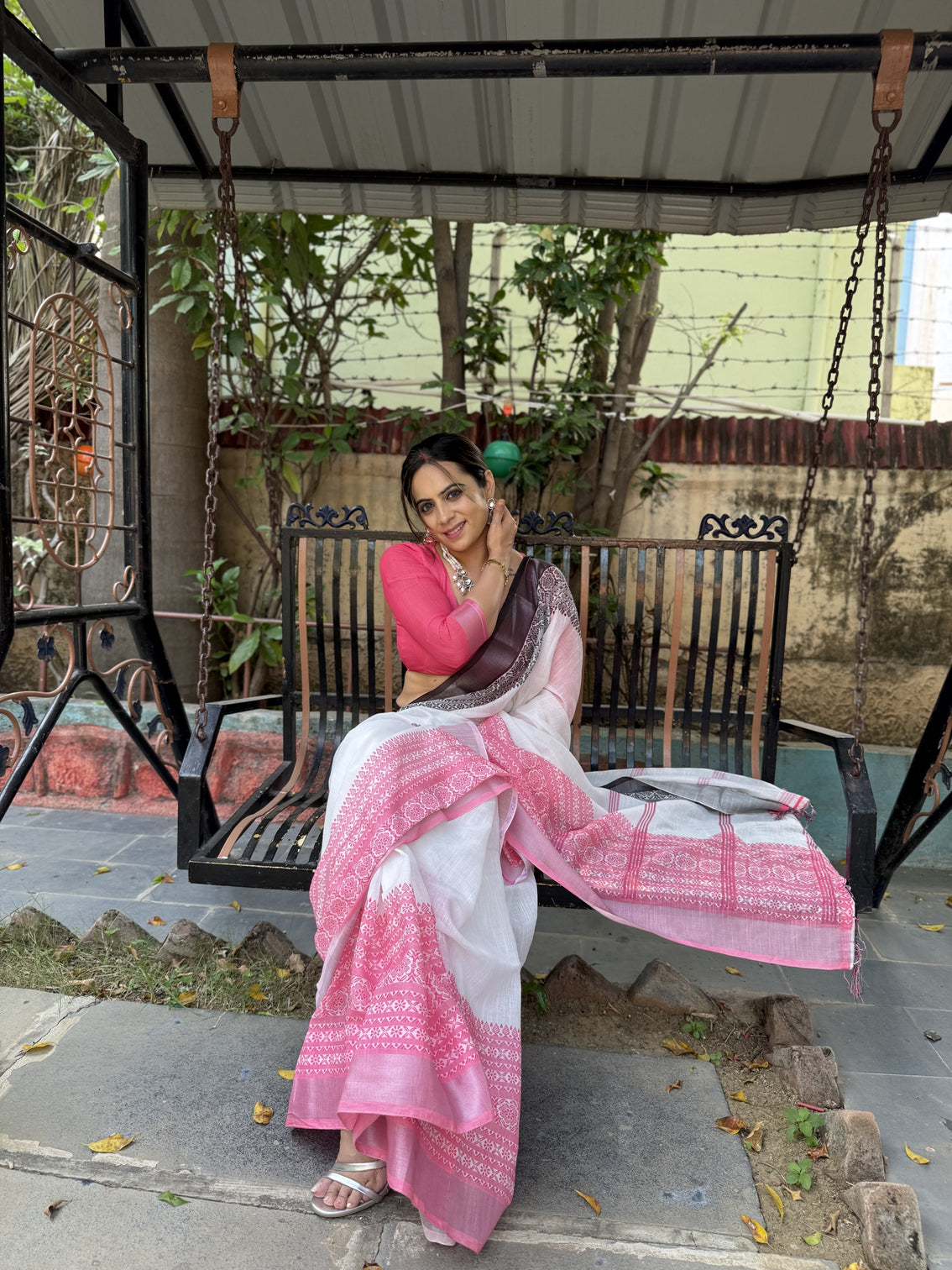 Elegant white and pink pure linen digital printed saree with black border tassels and blouse piece intricate floral and geometric design