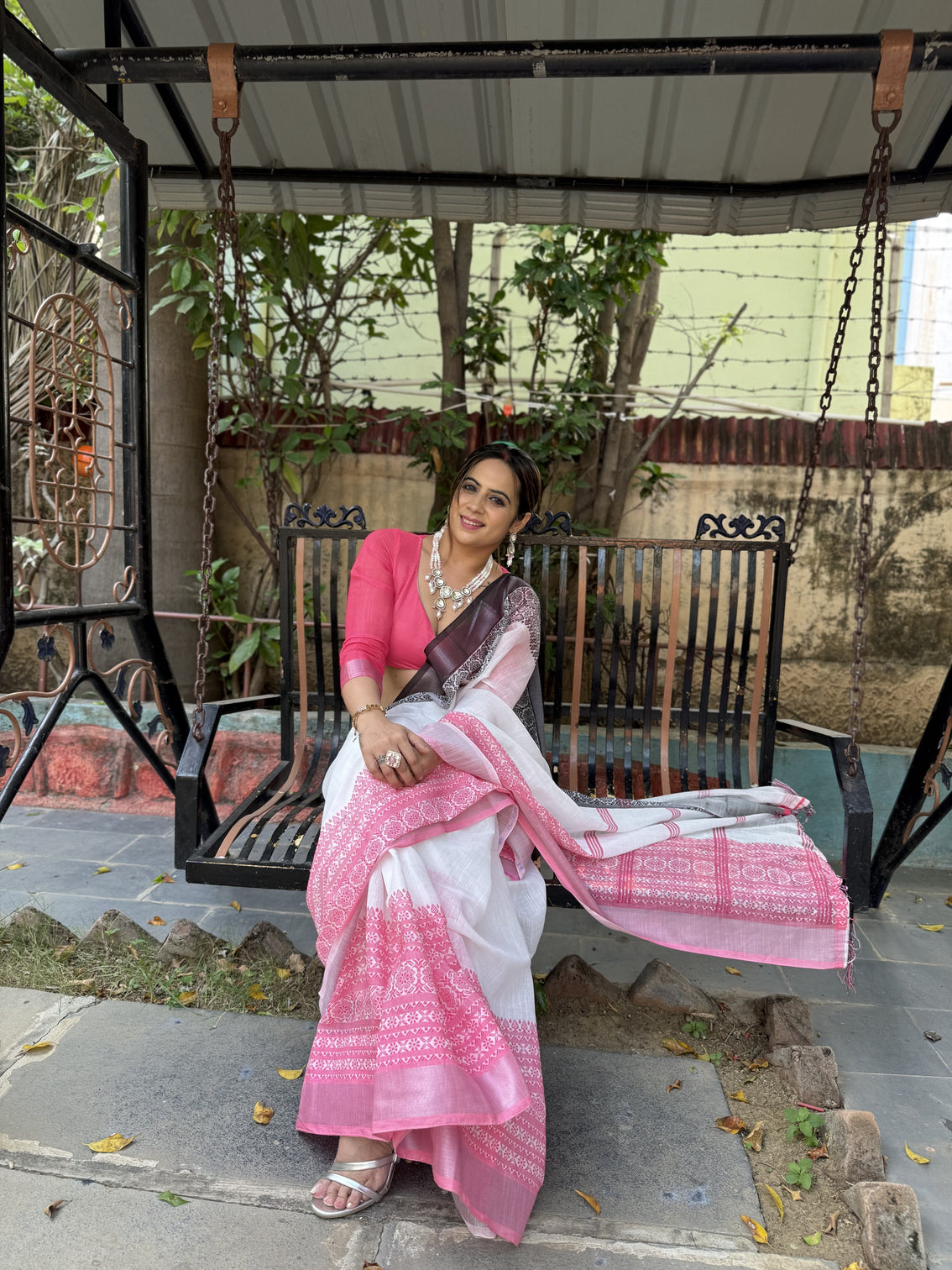Elegant white and pink pure linen digital printed saree with black border tassels and blouse piece intricate floral and geometric design