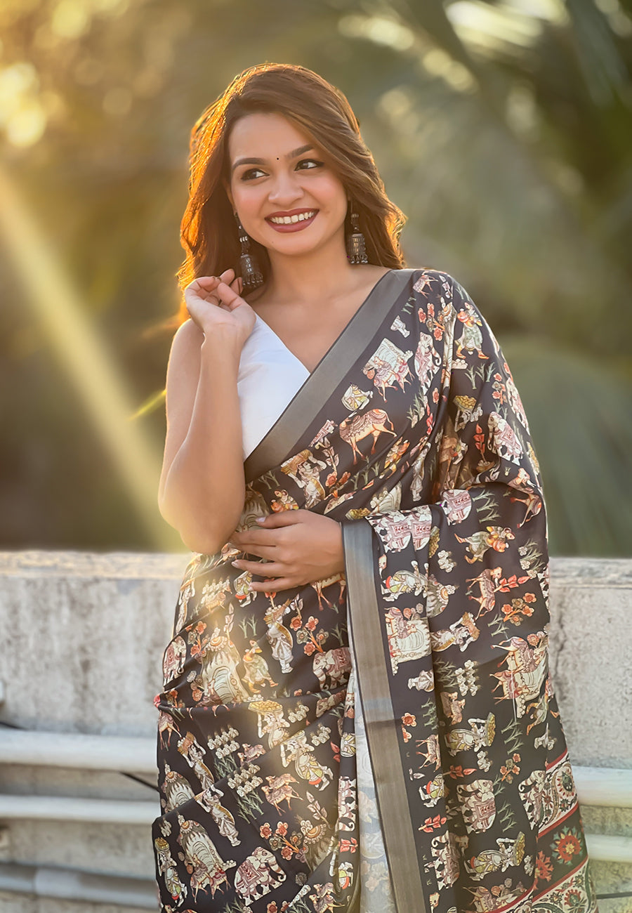 Black tussar silk printed saree with zari woven border