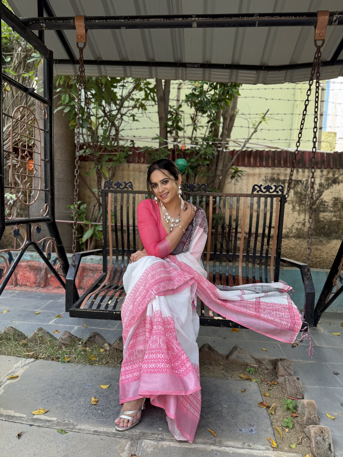 Elegant white and pink pure linen digital printed saree with black border tassels and blouse piece intricate floral and geometric design