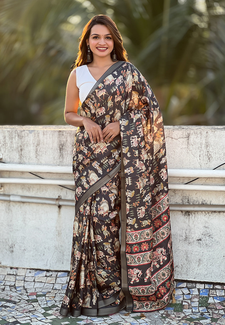 Black tussar silk printed saree with zari woven border