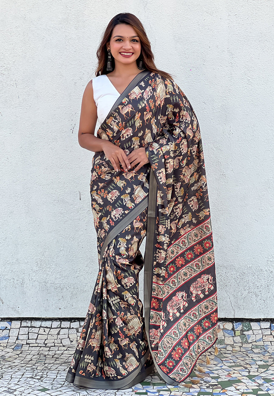 Black tussar silk printed saree with zari woven border