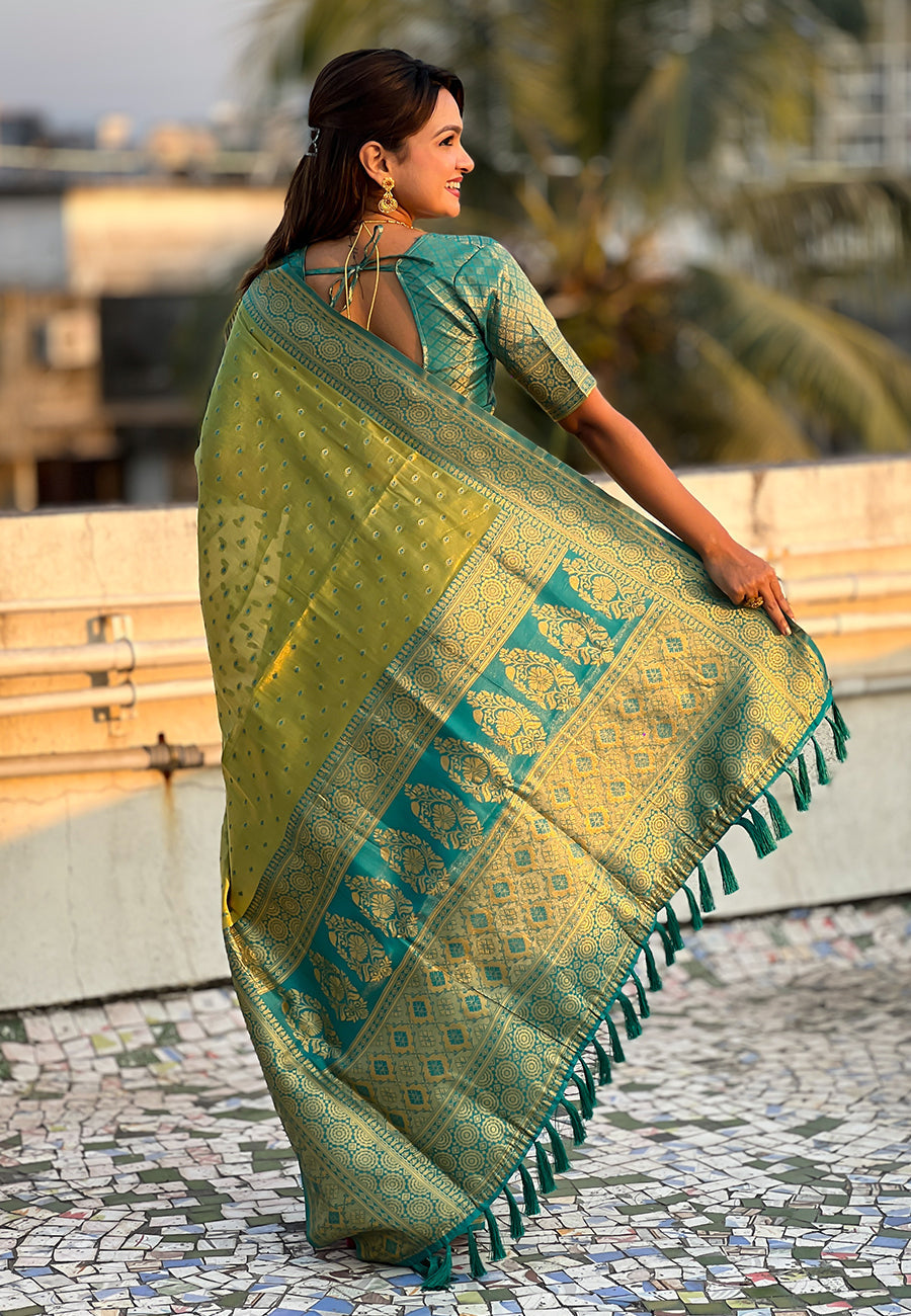 Green pure tissue zari woven saree with contrast weaves
