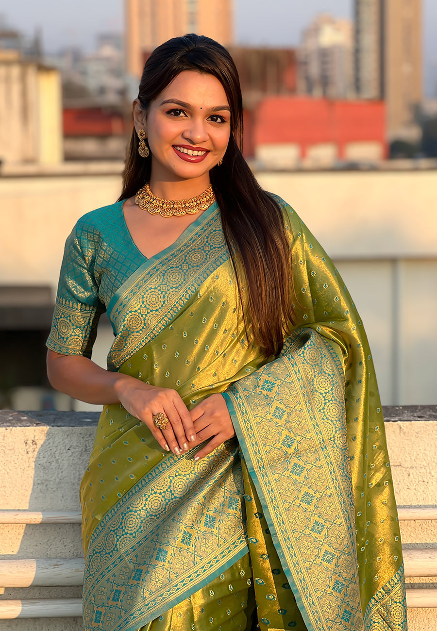 Green pure tissue zari woven saree with contrast weaves