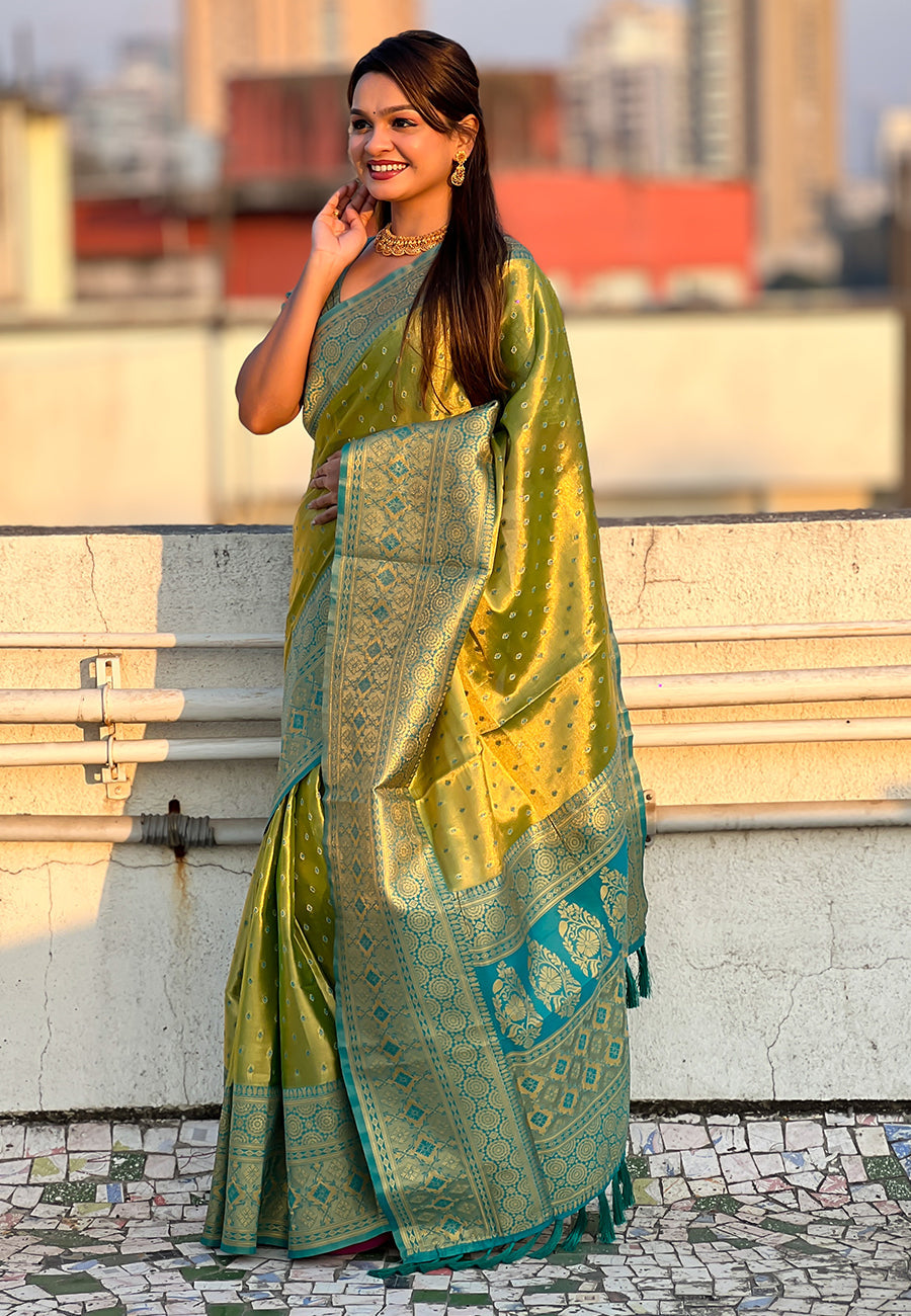 Green pure tissue zari woven saree with contrast weaves