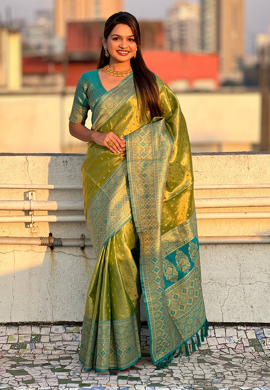 Green pure tissue zari woven saree with contrast weaves