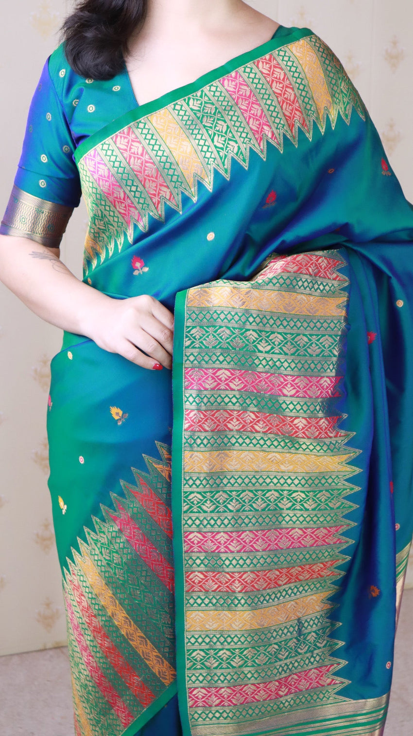 Green soft silk meenakari zari woven saree with temple border