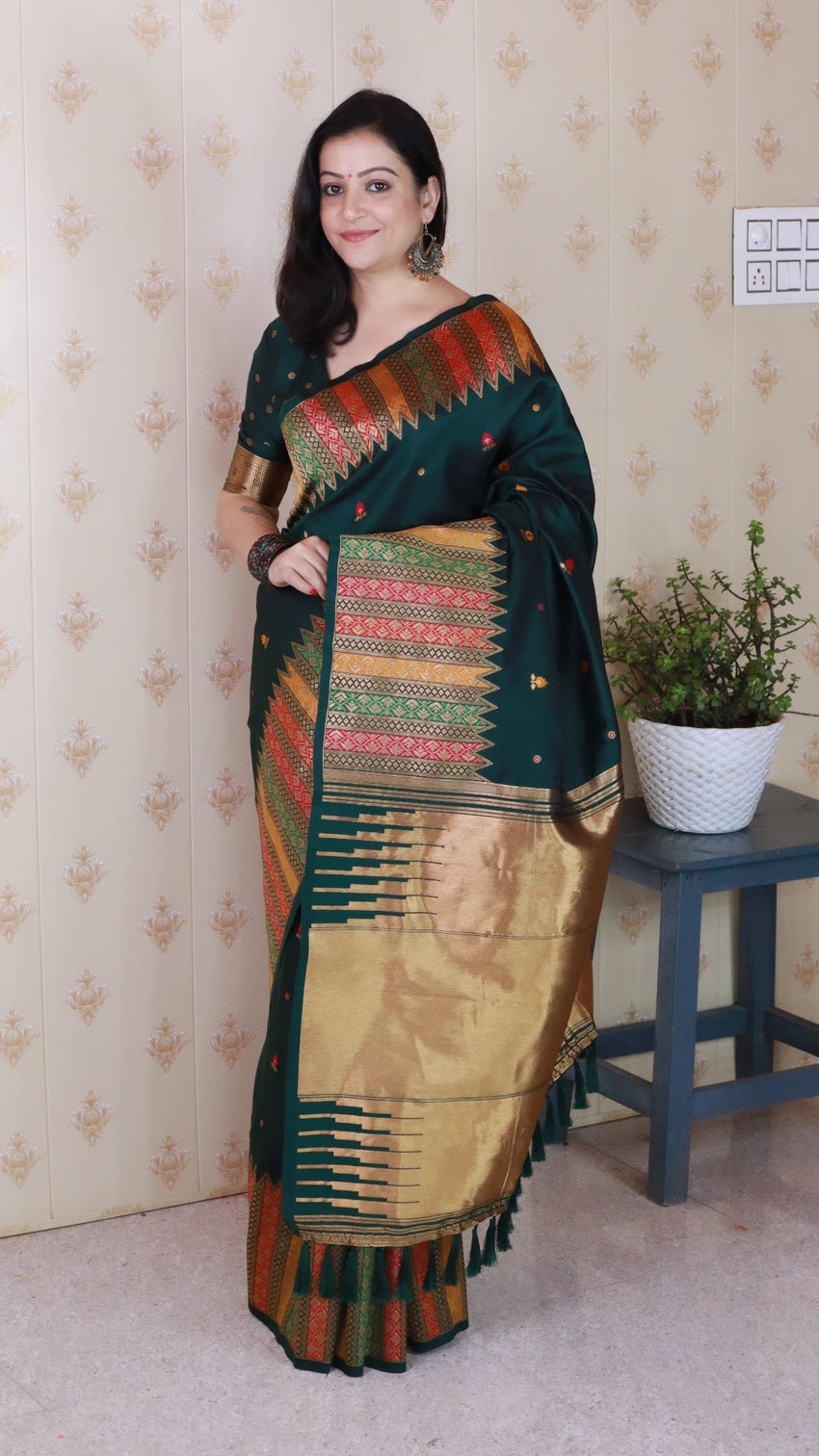 Bottle green soft silk meenakari zari woven saree with temple border