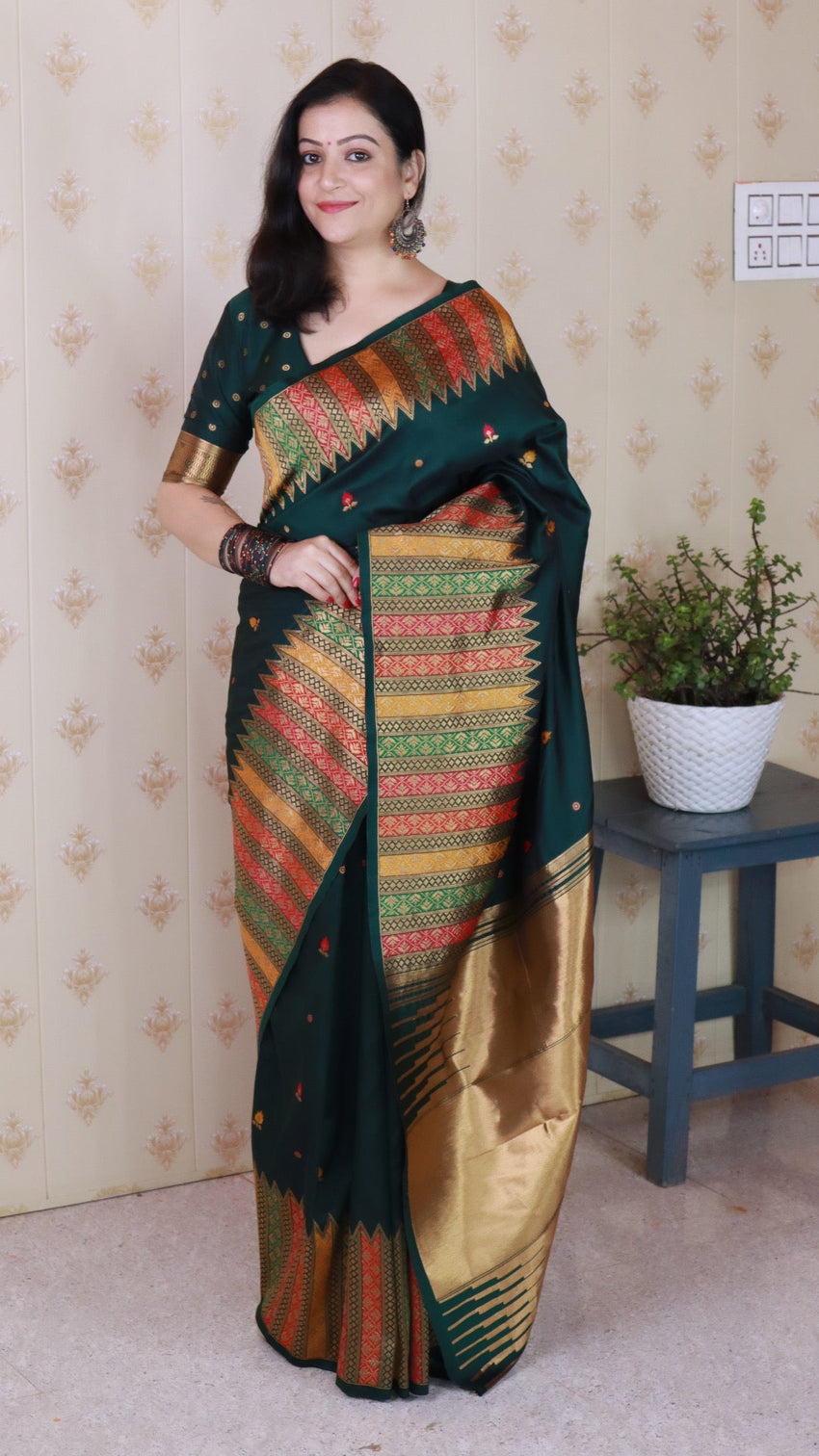 Bottle green soft silk meenakari zari woven saree with temple border