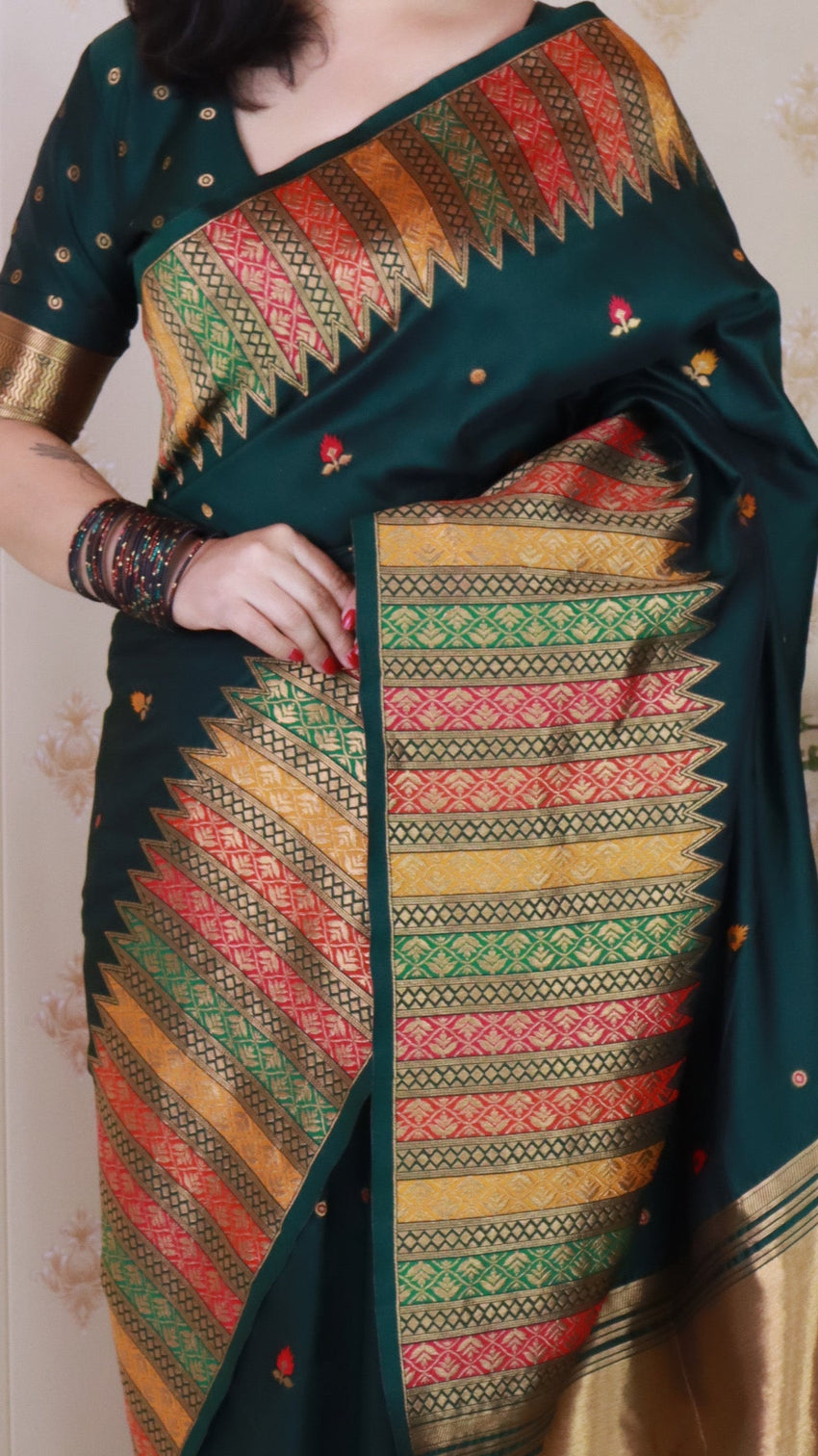 Bottle green soft silk meenakari zari woven saree with temple border