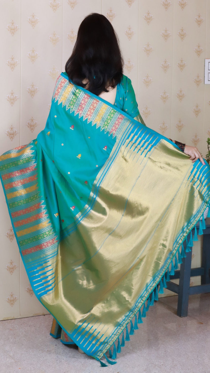 Aqua blue soft silk meenakari zari woven saree with temple border