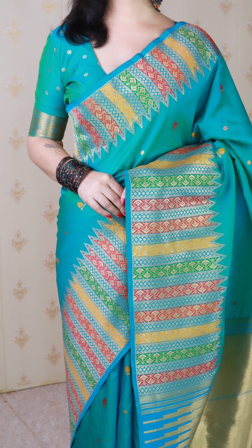 Aqua blue soft silk meenakari zari woven saree with temple border