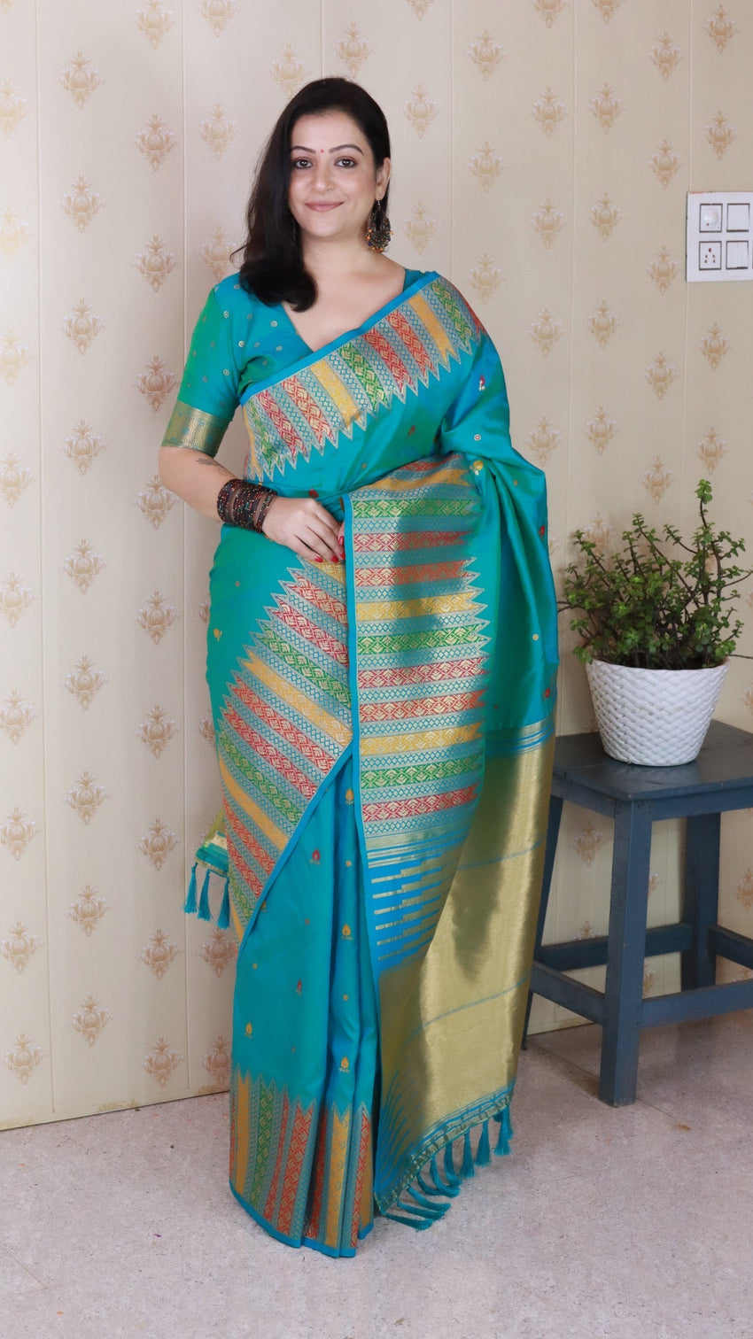 Aqua blue soft silk meenakari zari woven saree with temple border