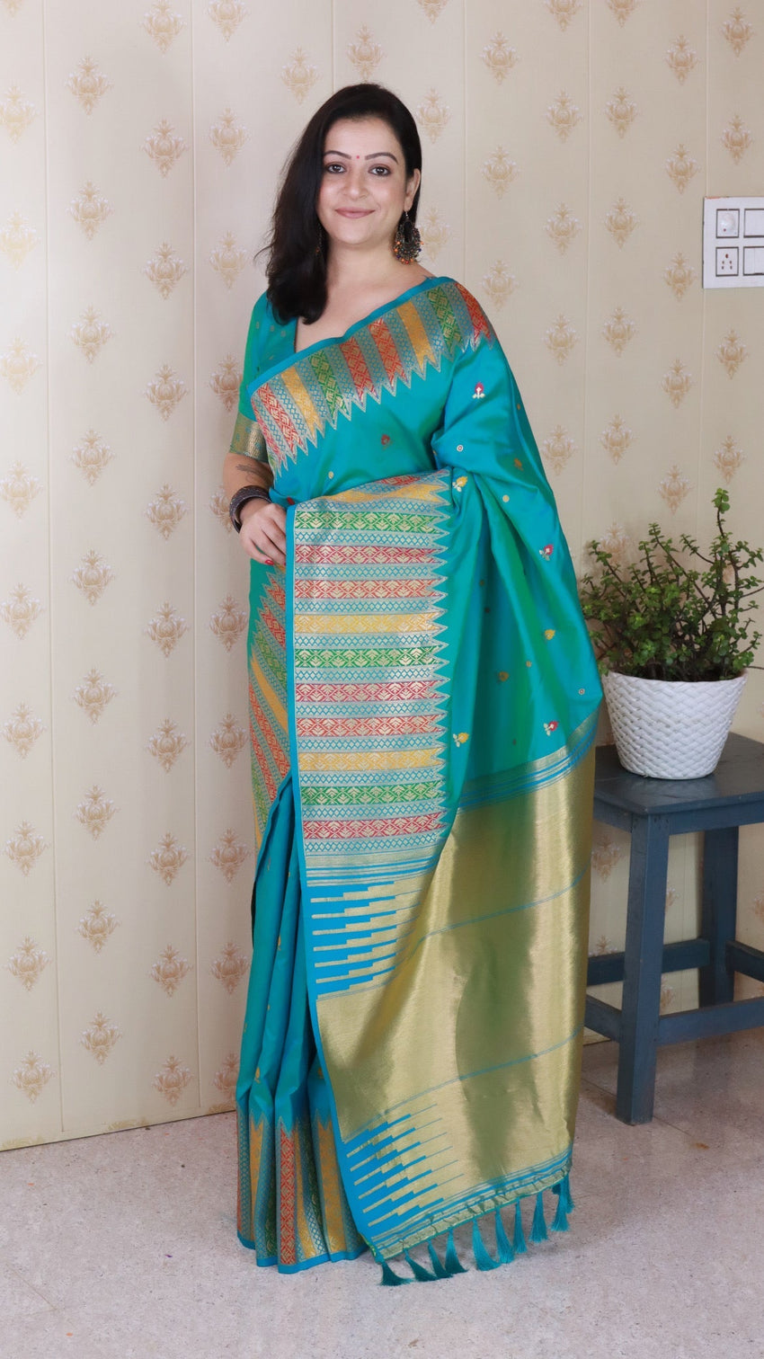 Aqua blue soft silk meenakari zari woven saree with temple border