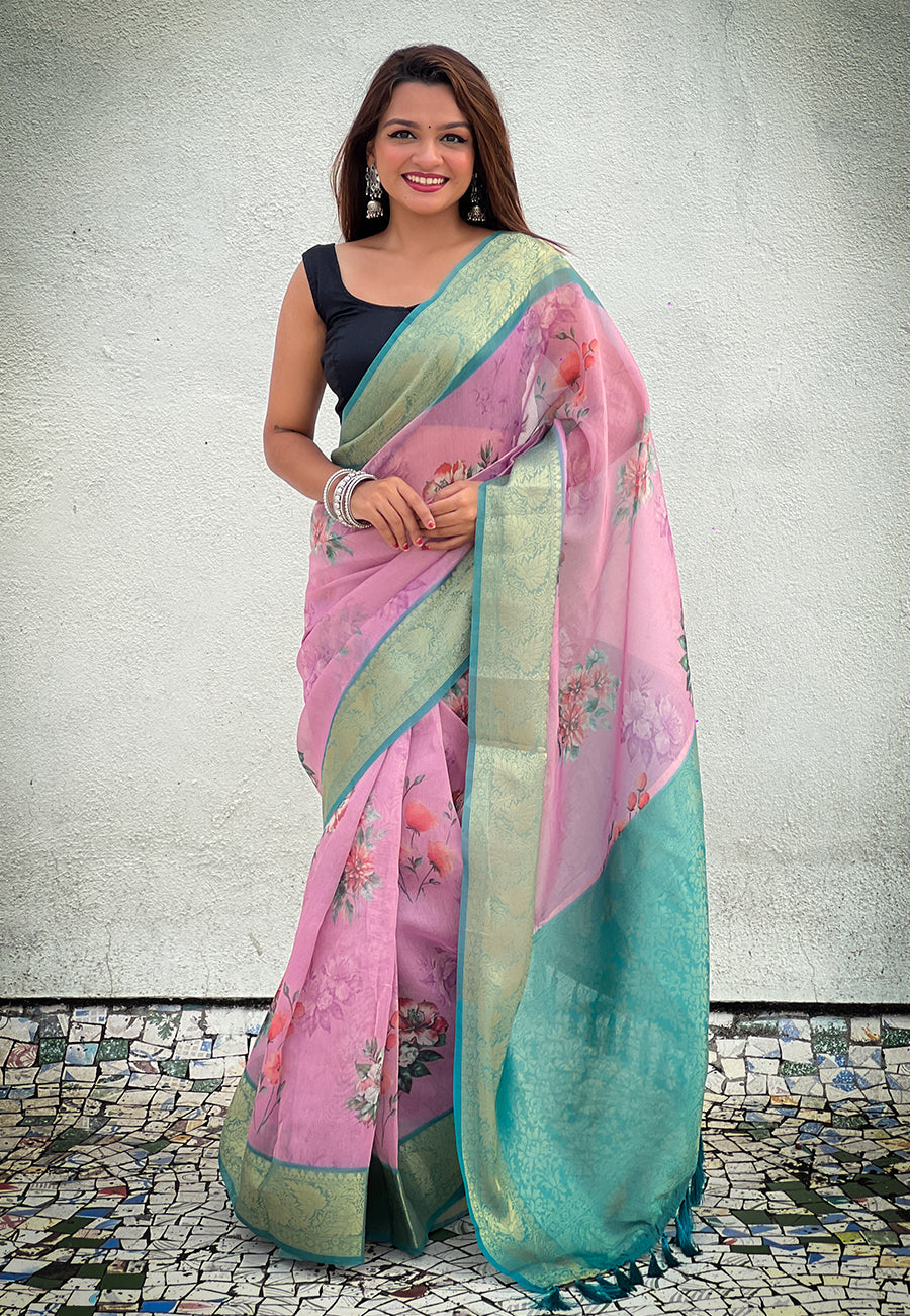 Baby pink tissue crush silk floral printed saree with zari woven border