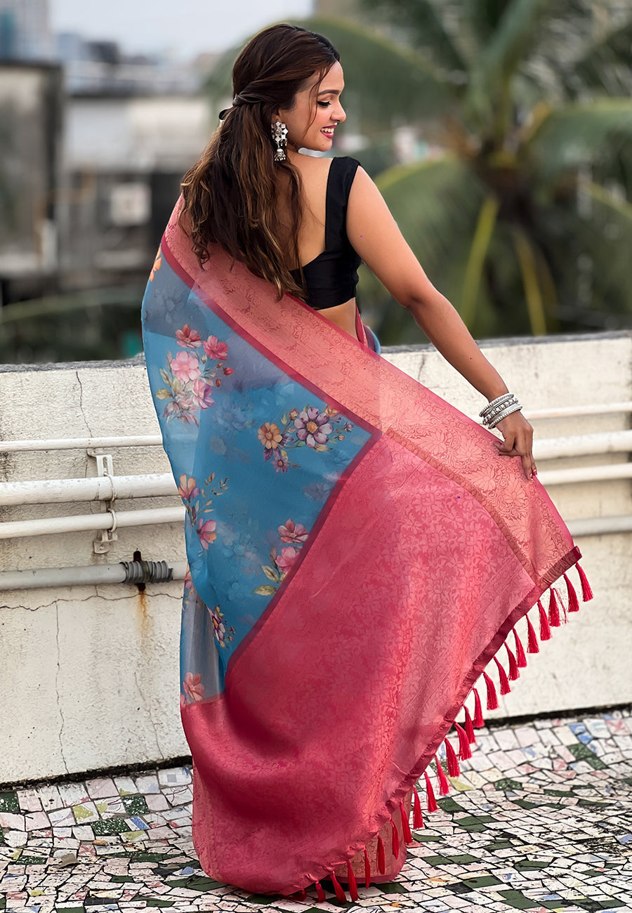 Blue tissue crush silk floral printed saree with zari woven border