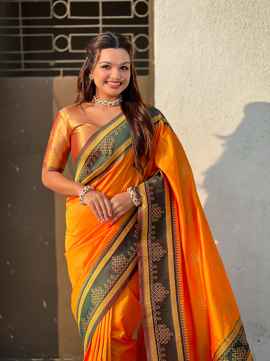 Orange soft silk traditional zari contrast woven saree