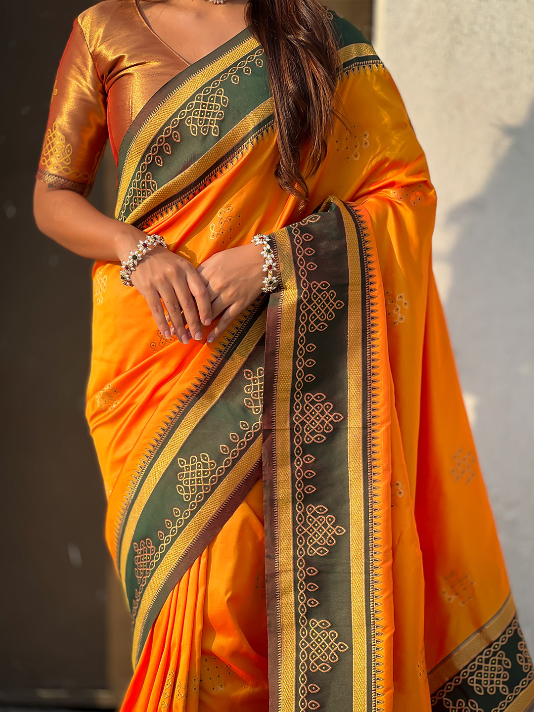 Orange soft silk traditional zari contrast woven saree