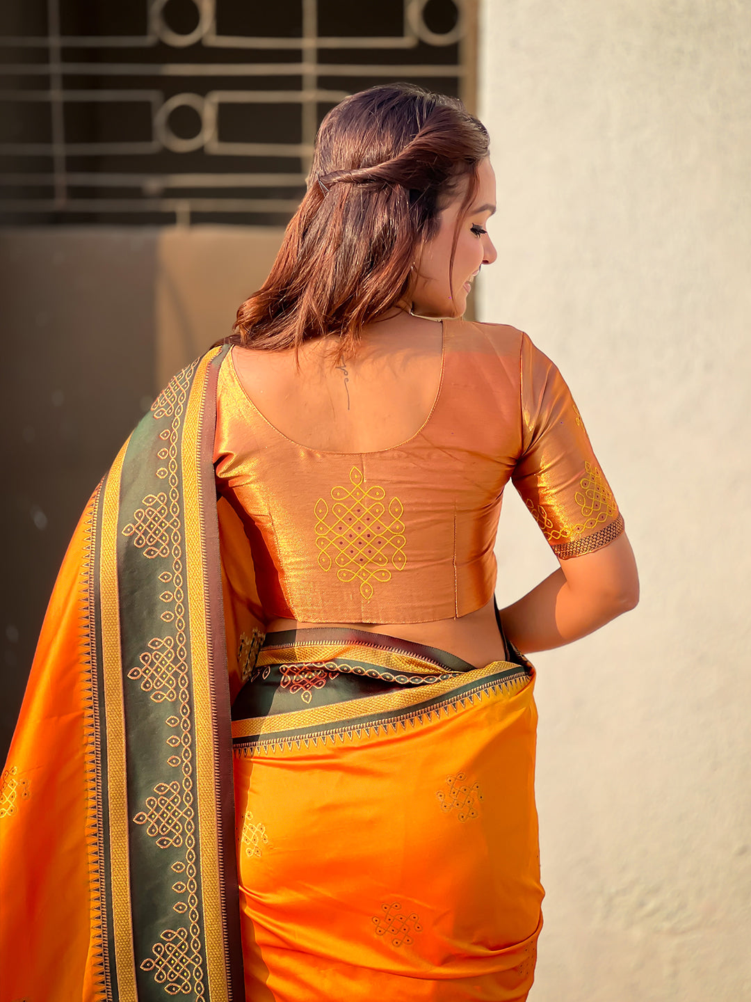 Orange soft silk traditional zari contrast woven saree