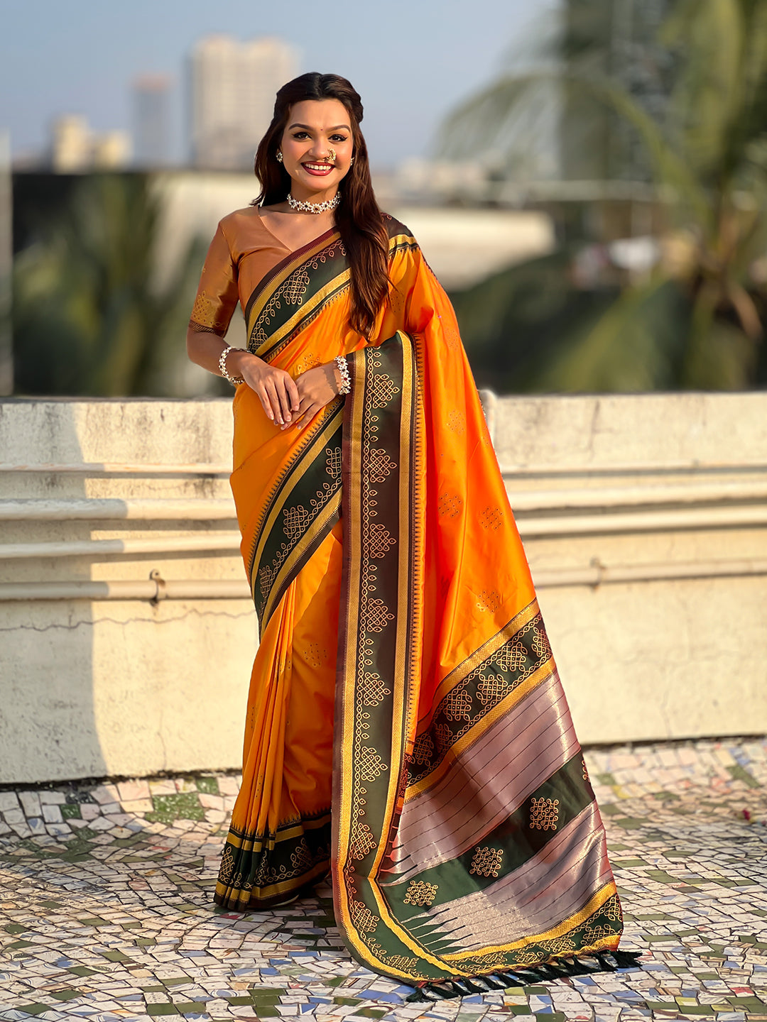 Orange soft silk traditional zari contrast woven saree