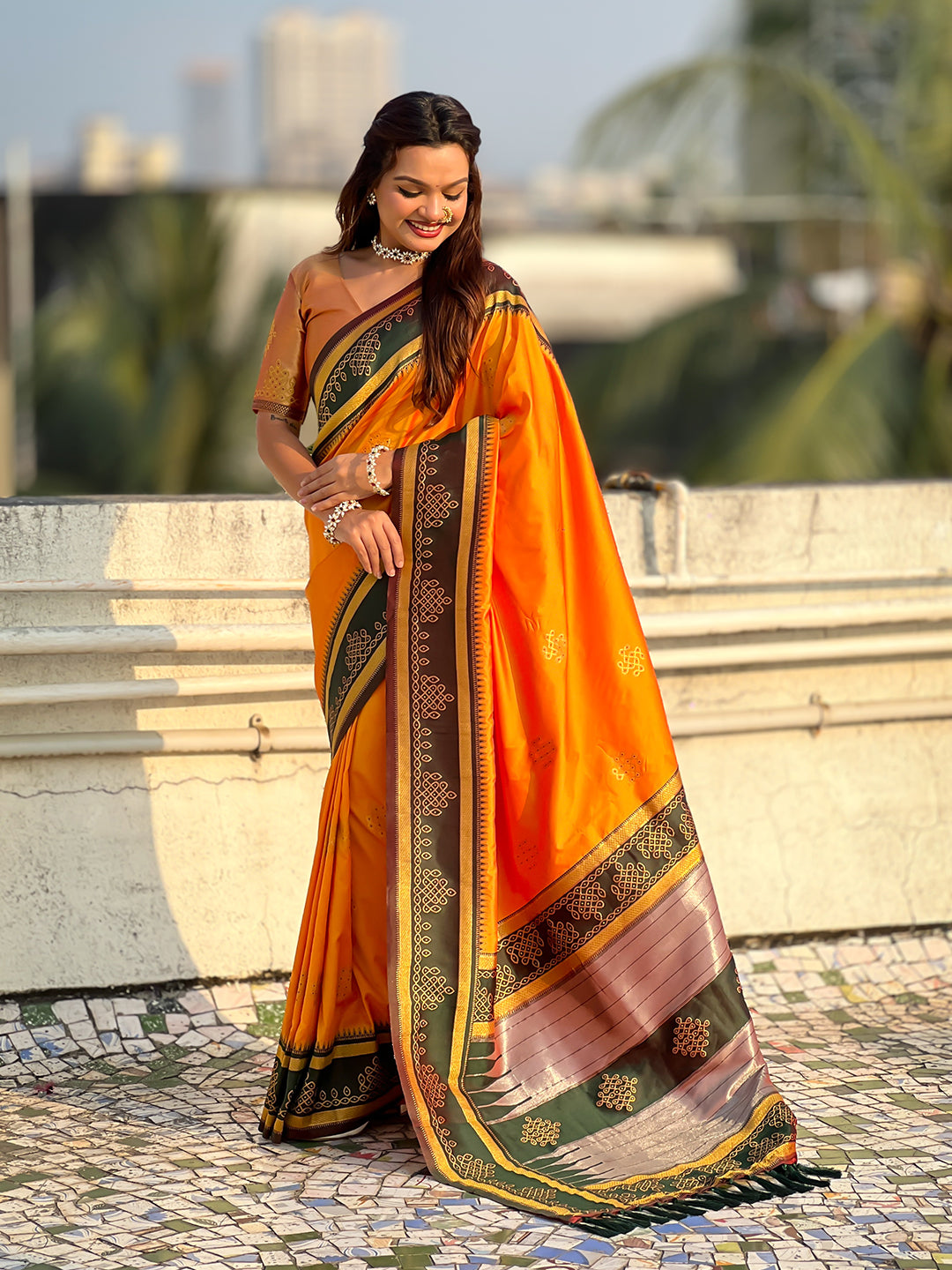 Orange soft silk traditional zari contrast woven saree