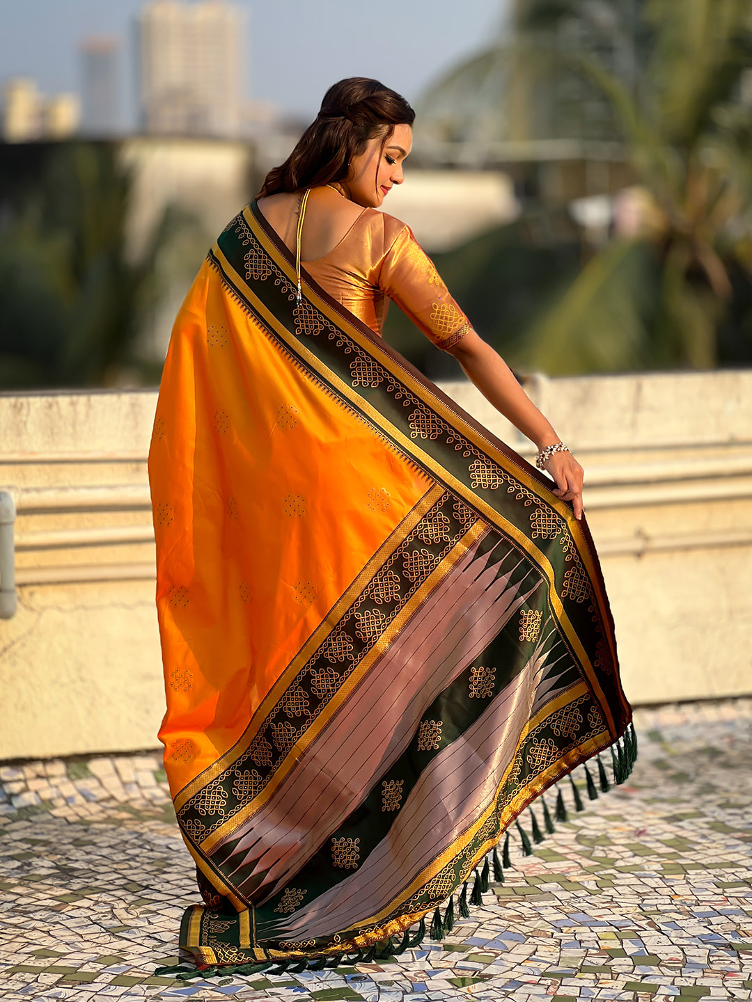 Orange soft silk traditional zari contrast woven saree