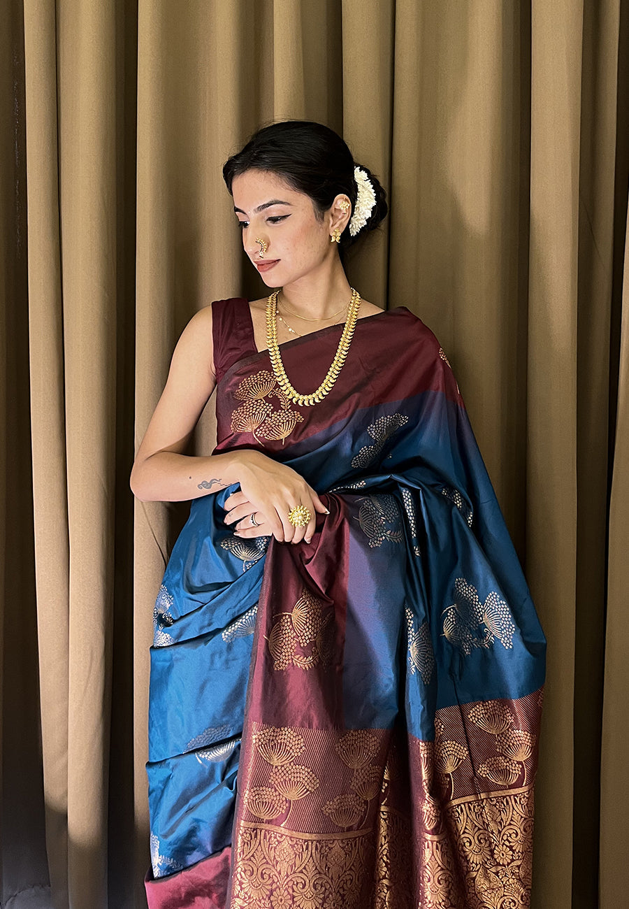 Samiksha in our Blue Soft Silk Floral Border Contrast Zari Woven Saree