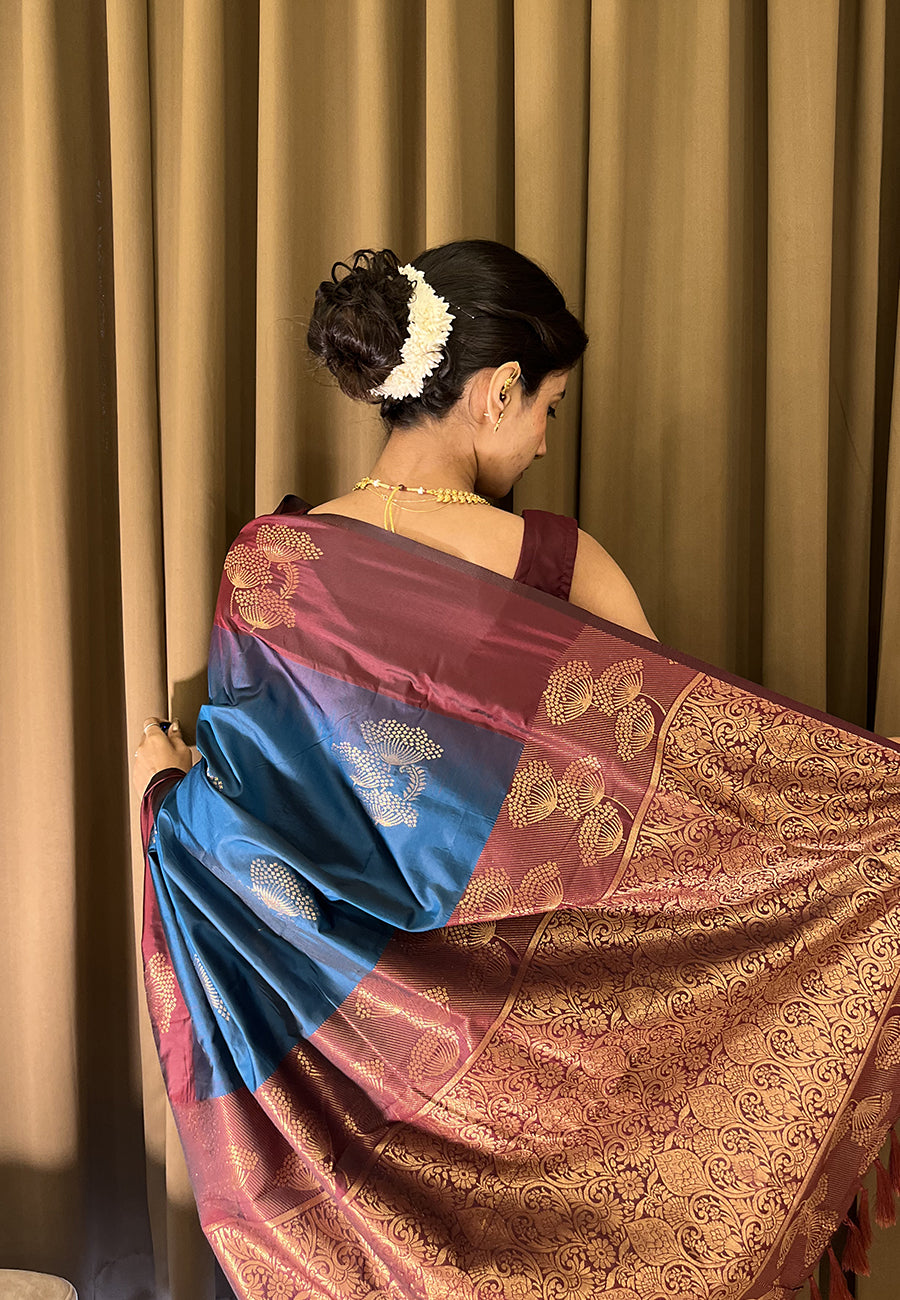 Samiksha in our Blue Soft Silk Floral Border Contrast Zari Woven Saree