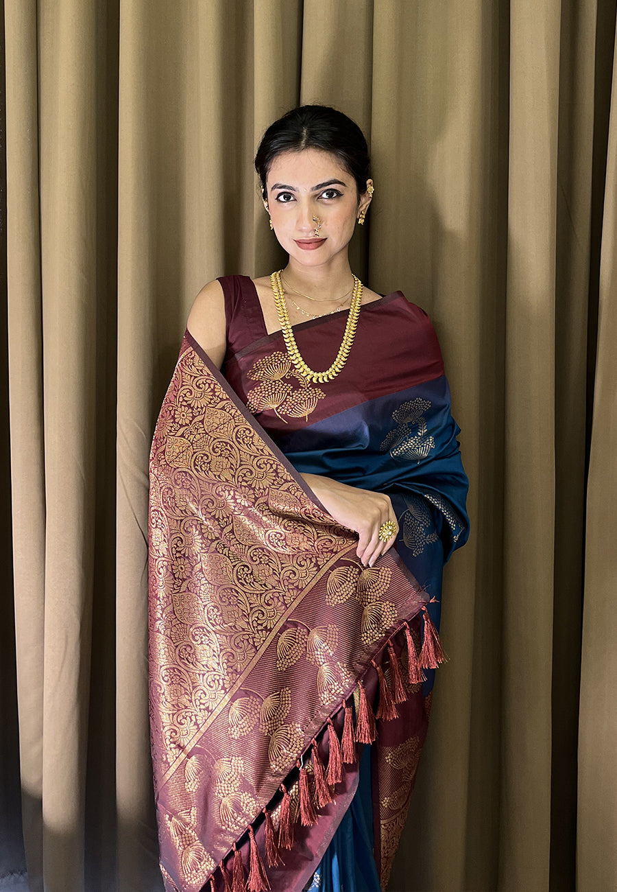 Samiksha in our Blue Soft Silk Floral Border Contrast Zari Woven Saree