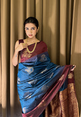 Samiksha in our Blue Soft Silk Floral Border Contrast Zari Woven Saree
