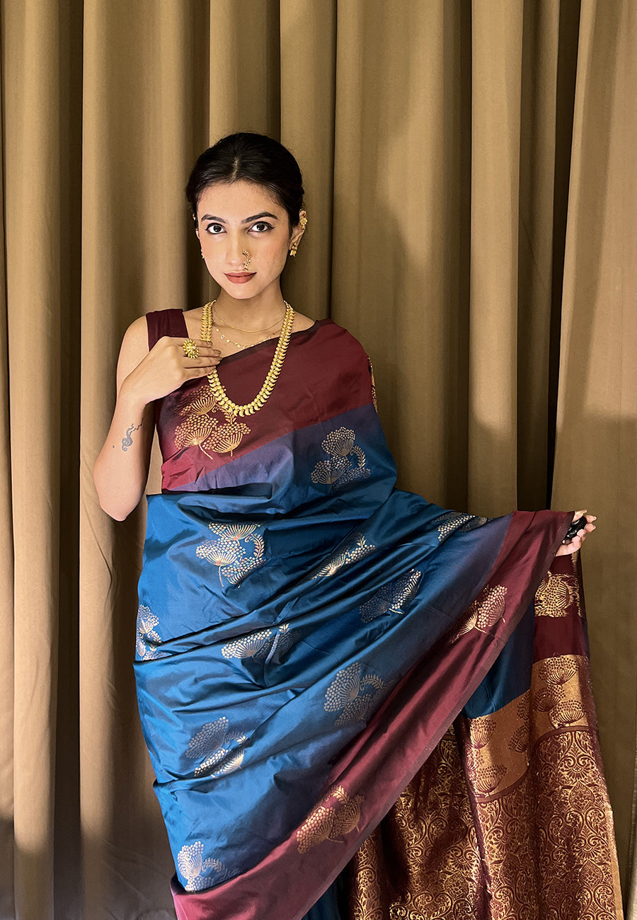 Samiksha in our Blue Soft Silk Floral Border Contrast Zari Woven Saree