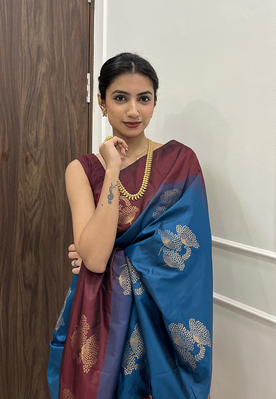 Samiksha in our Blue Soft Silk Floral Border Contrast Zari Woven Saree