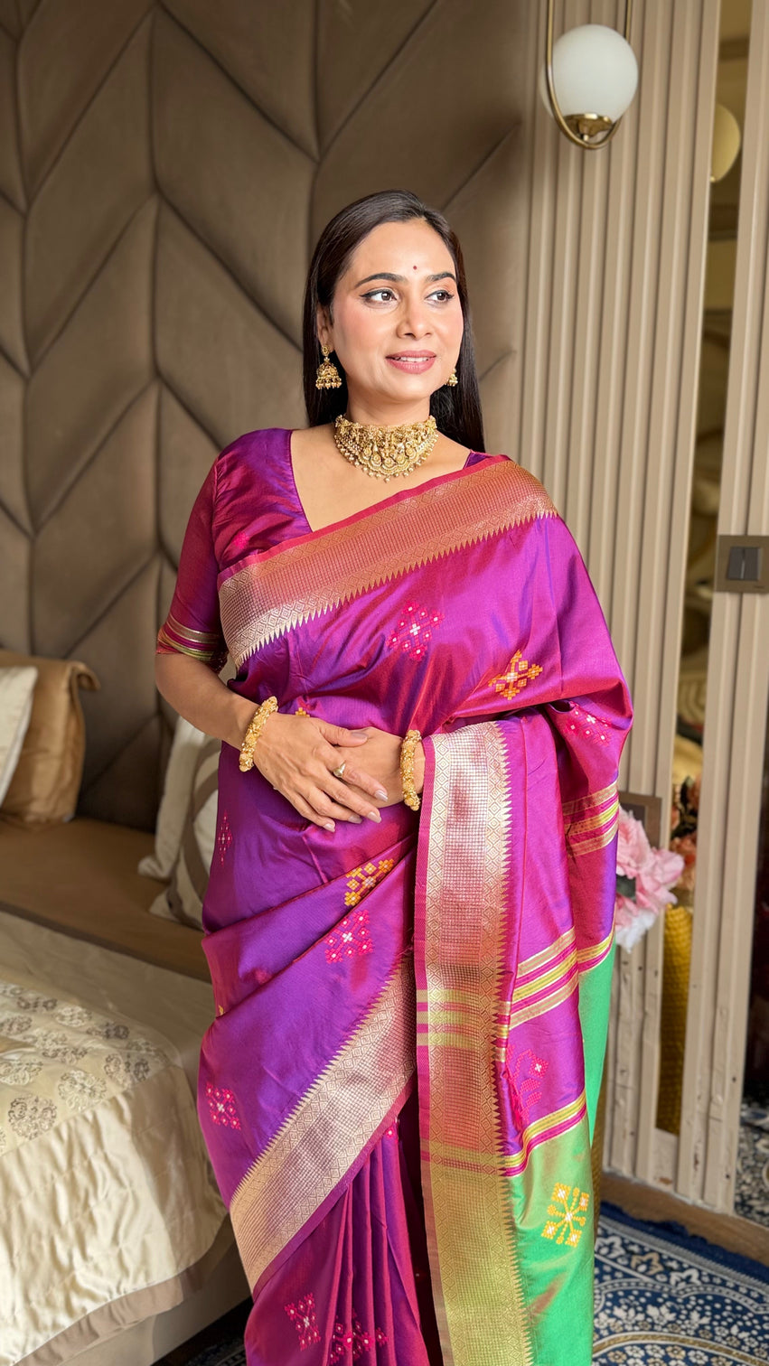 Magenta soft silk ikkat patola saree with meenakari motifs peacock pallu and gold zari border