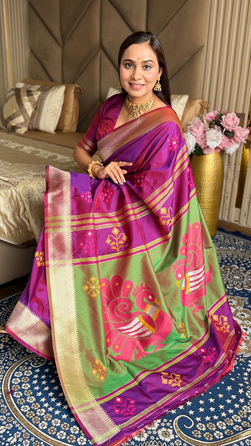 Magenta soft silk ikkat patola saree with meenakari motifs peacock pallu and gold zari border