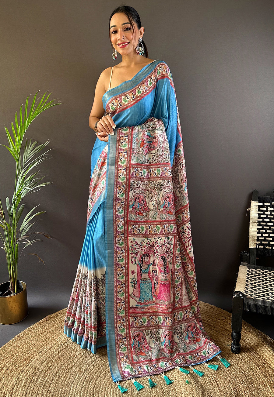 Curious blue tussar silk madhubani printed saree with zari woven border